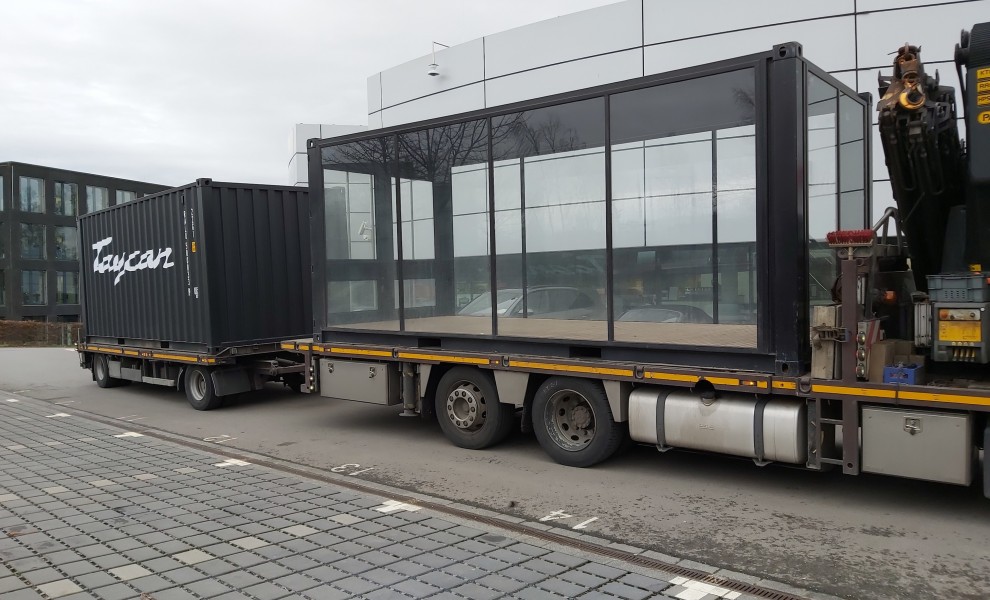Stacked showroom container with car