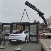 Stacked showroom container with car