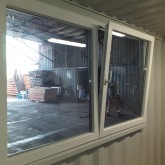 Double tilt- turning window