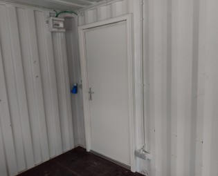 20ft black bar container with hatch and electricity - Wicked door