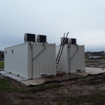 White 20ft shipping containers with airco as technical area